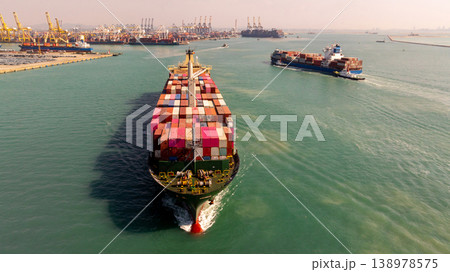 Aerial view container ship carrier container on the sea, Global business logistics and Global trade transportation, Container ship freight shipping import export logistics supply chain. Aerial view container ship carrier container on the sea, Global business logistics and Global trade transportation, Container ship freight shipping import export logistics supply chain. 138978575