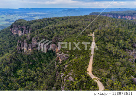 Aerial view over Hargraves Lookout in the Blue Mountains, New South Wales, Australia. The scenic landscape shows dramatic sandstone cliffs, deep valleys and forest covered wilderness 138978611