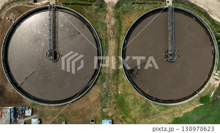 Aerial view wastewater treatment plant. Circular sedimentation tanks biological reactor, Water cleaning facility wastewater treatment plant, Recirculation solid contact clarifier sedimentation tank. 138978623