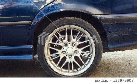 The rear wheel of an old car. The slower you go The rear wheel of an old car. The slower you go 138979908