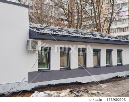 Completion of construction of technical extension to building 138980608