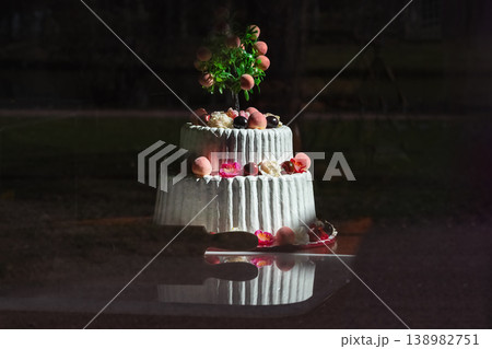gorgeous white cake was shot in a dark key gorgeous white cake was shot in a dark key 138982751