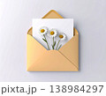 Light beige color. Post envelope with chamomile flowers decoration. Greeting message. Mockup design. 138984297