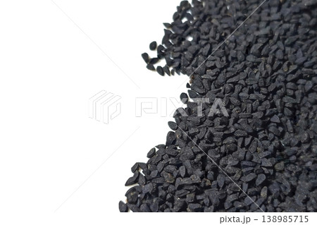 Black cumin seeds pile isolated on white background Black cumin seeds pile isolated on white background 138985715