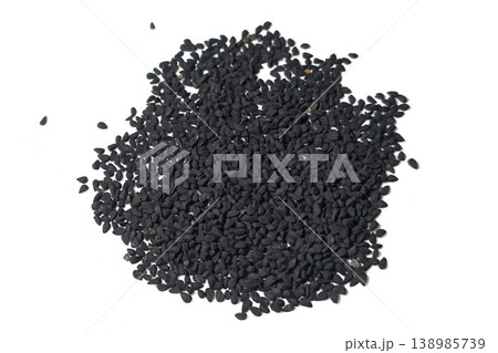 Black cumin seeds pile isolated on white background Black cumin seeds pile isolated on white background 138985739