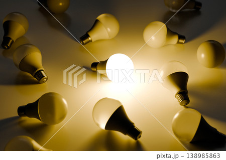 Glowing Light Bulb Among Unlit Bulbs Concept of Idea Innovation and Leadership 138985863