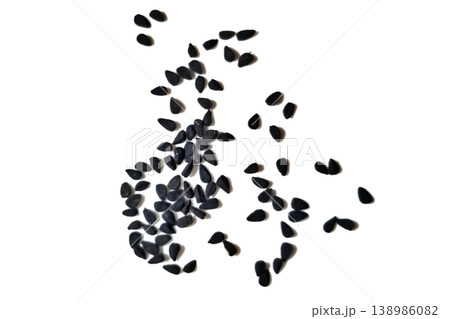 Black cumin seeds pile isolated on white background Black cumin seeds pile isolated on white background 138986082