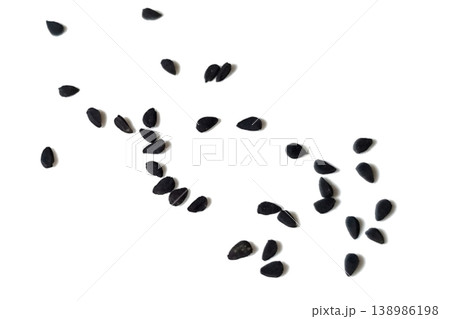 Black cumin seeds pile isolated on white background Black cumin seeds pile isolated on white background 138986198