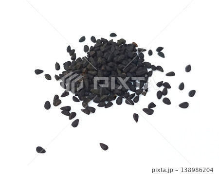 Black cumin seeds pile isolated on white background Black cumin seeds pile isolated on white background 138986204