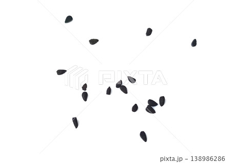 Black cumin seeds pile isolated on white background Black cumin seeds pile isolated on white background 138986286
