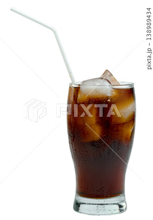 Refreshing glass of cola soda with ice cubes and a white flexible straw. Cold dark fizzy beverage with condensation droplets on the exterior. 138989434