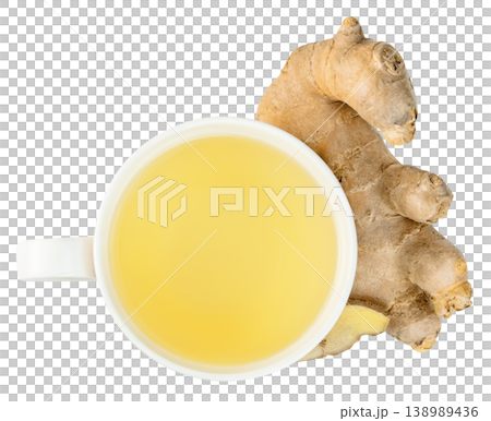 Top view of a white mug filled with hot ginger tea next to a fresh raw ginger root. Healthy herbal beverage for wellness and cold relief isolated. Studio overhead macro shot. Top view of a white mug filled with hot ginger tea next to a fresh raw ginger root. Healthy herbal beverage for wellness and cold relief isolated. Studio overhead macro shot. 138989436
