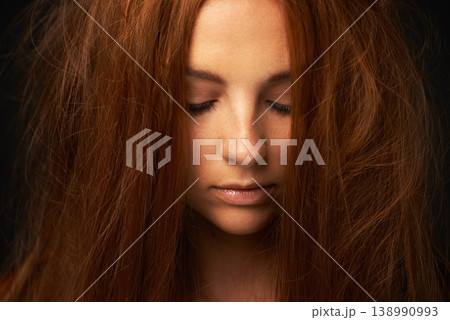 Depression, thinking or sad woman in studio with trauma stress, fail or bad results alone. Black background, psychology or face of a lonely female person with anger, messy hair or moody attitude 138990993