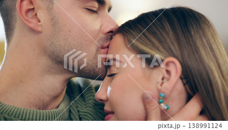 Couple, kiss and forehead for love, support and trust in relationship, romance and security in marriage. Happy people, connection and commitment or gratitude, bonding and hug or affection in closeup Couple, kiss and forehead for love, support and trust in relationship, romance and security in marriage. Happy people, connection and commitment or gratitude, bonding and hug or affection in closeup 138991124