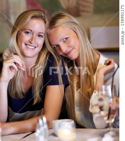 Portrait, women or friends in a cafe, smile or relax with happiness, bonding together or funny. Face, people or girls with conversation, cheerful or restaurant with gossip, sharing secret or speaking Portrait, women or friends in a cafe, smile or relax with happiness, bonding together or funny. Face, people or girls with conversation, cheerful or restaurant with gossip, sharing secret or speaking 138991175