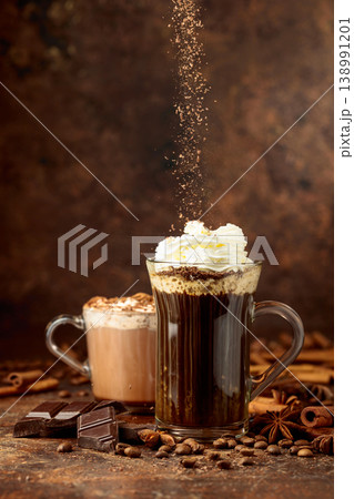 Coffee and hot chocolate with whipped cream. Coffee and hot chocolate with whipped cream. 138991201