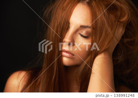 Hair care, relax or woman with beauty, natural skincare or results for glow, shine or collagen in studio. Black background, face or calm model with cosmetics for treatment, healthy texture or growth Hair care, relax or woman with beauty, natural skincare or results for glow, shine or collagen in studio. Black background, face or calm model with cosmetics for treatment, healthy texture or growth 138991248
