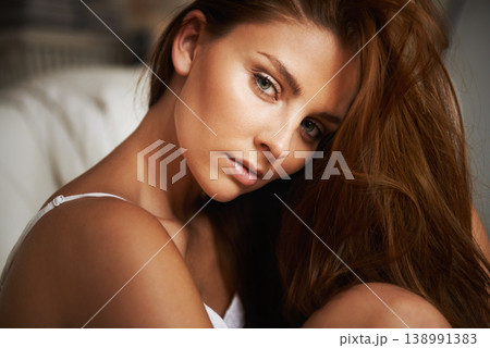 Hair care, portrait or model in bedroom with beauty, skincare or results for glow, shine or collagen. Wellness, face or elegant woman with confidence, healthy texture or growth in home in the morning 138991383