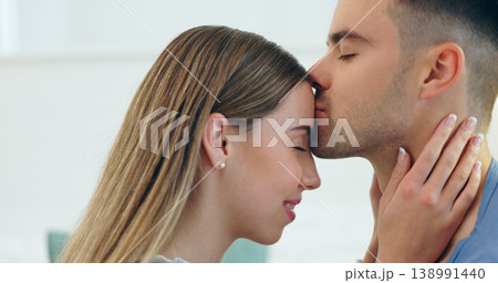 Forehead, kiss and couple hug with love, support and connection, bonding and date in their home. Happy, care and people embrace in a house with trust, gratitude or sweet, relationship or security Forehead, kiss and couple hug with love, support and connection, bonding and date in their home. Happy, care and people embrace in a house with trust, gratitude or sweet, relationship or security 138991440
