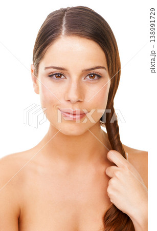 Woman, portrait and happy in studio for hair care, cosmetics and hand with keratin treatment for shine. Person, face and confidence with shampoo, hairstyle and collagen glow on white background 138991729