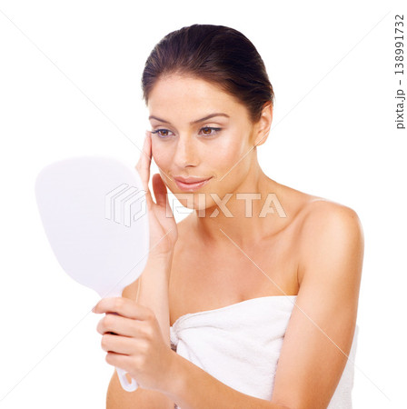 Happy woman, mirror and skincare for makeup, beauty or product isolated against a white studio background. Female person or model applying lotion, cream or treatment for facial cosmetics on face Happy woman, mirror and skincare for makeup, beauty or product isolated against a white studio background. Female person or model applying lotion, cream or treatment for facial cosmetics on face 138991732