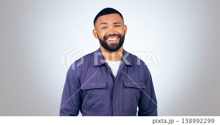 Portrait, laugh and happy business man in studio with humor, joke or funny personality on grey background. comic, face and isolated entrepreneur with confidence, positive attitude or feel good mood 138992299