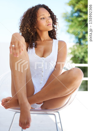 Thinking, chair and morning with a sexy woman outdoor in summer on the balcony of her home to relax. Wellness, idea and vision with a young model in pajamas outside of her apartment on the weekend 138992366