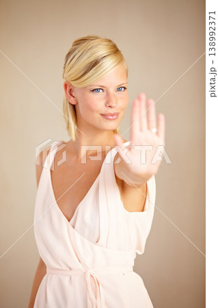 Woman, happy and wedding ring in studio with smile, thinking and engagement for commitment by background. Girl, model and jewelry for marriage proposal, diamond and ideas for celebration at ceremony 138992371