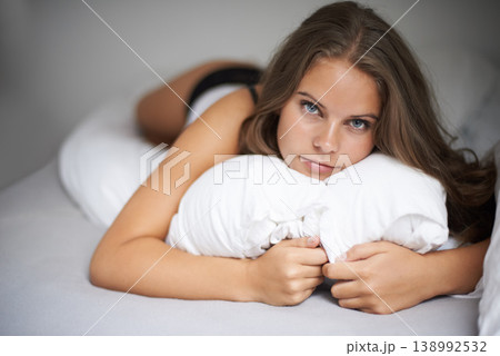House, woman and bed pillow with portrait with rest and relax in a bedroom with underwear and calm. Casual, fashion and confidence with nap at home on blanket and sheets lying down with peace House, woman and bed pillow with portrait with rest and relax in a bedroom with underwear and calm. Casual, fashion and confidence with nap at home on blanket and sheets lying down with peace 138992532