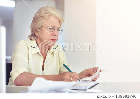 Retirement, senior woman and planning budget on paperwork for tax, financial documents or receipt, investment or savings. Elderly person, finance or money or papers of pension bills management mockup Retirement, senior woman and planning budget on paperwork for tax, financial documents or receipt, investment or savings. Elderly person, finance or money or papers of pension bills management mockup 138992740