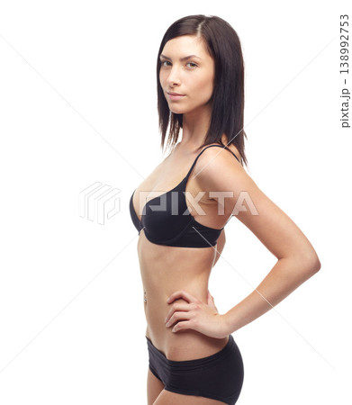 Young woman, portrait and full body in lingerie on mockup to lose weight or diet against a white studio background. Attractive female person or slim model posing in underwear for health and wellness Young woman, portrait and full body in lingerie on mockup to lose weight or diet against a white studio background. Attractive female person or slim model posing in underwear for health and wellness 138992753