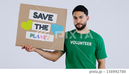 Volunteer man, poster and studio portrait to save the planet in global warming, crisis or ecology by background. Person, social responsibility and cardboard sign for sustainability for climate change 138992780