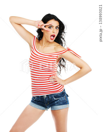Woman, surprised and peace sign in studio with fashion, trendy outfit or wow on white background. Person, face and shocked with v hands or expression with freedom, carefree and confidence or makeup Woman, surprised and peace sign in studio with fashion, trendy outfit or wow on white background. Person, face and shocked with v hands or expression with freedom, carefree and confidence or makeup 138993021