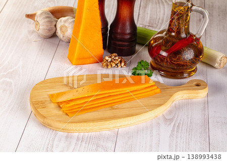 Yellow cheddae cheese slices snack Yellow cheddae cheese slices snack 138993438