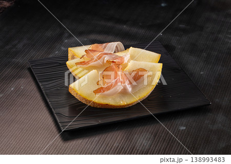 Slised sweet melon with Jamon Slised sweet melon with Jamon 138993483