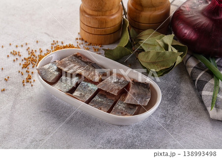 Salted herring fillet pieses snack 138993498