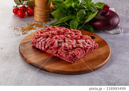 Raw minced beef meat over board Raw minced beef meat over board 138993499