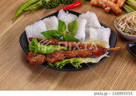 Tasty asian grilled pork skewer Tasty asian grilled pork skewer 138993555