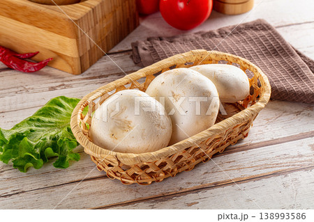 Raw white champignon mush heap 138993586