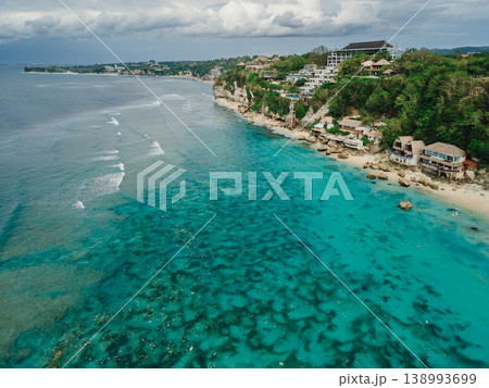 Bali coastline with cliffs, luxury resorts and turquoise Indian ocean, aerial tropical landscape Bali coastline with cliffs, luxury resorts and turquoise Indian ocean, aerial tropical landscape 138993699