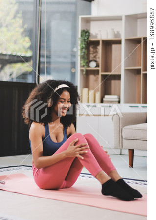 Women exercising in fitness studio yoga classes Women exercising in fitness studio yoga classes 138993887