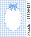 Blue gingham frame with bow and wavy scalloped border. Checkered card template for baby shower or birthday. 138994284