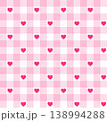 Seamless pink gingham pattern with hearts. Romantic checkered vector background. 138994288