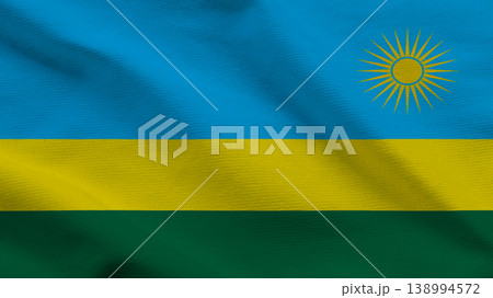 Celebrating Independence Day with the Rwandan flag waving proudly in the breeze Celebrating Independence Day with the Rwandan flag waving proudly in the breeze 138994572