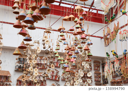 Beautiful handmade wind chimes made of clay at the small town of Raquira also known as The City of Pots in Colombia 138994790