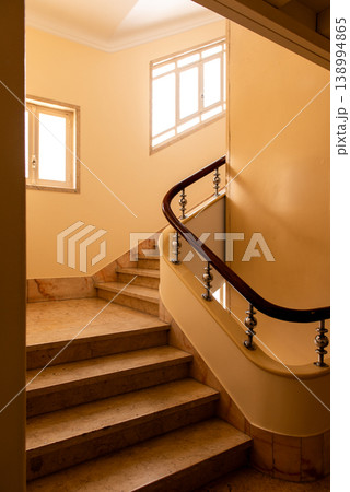 elegant old staircase with beautiful railing indoor elegant old staircase with beautiful railing indoor 138994865