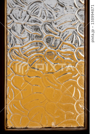 Stunning glass panels in a vintage style residence window Stunning glass panels in a vintage style residence window 138994871