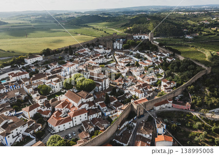 Aerial view of Obidos with historic walls and castle, Leiria district, Portugal Aerial view of Obidos with historic walls and castle, Leiria district, Portugal 138995008
