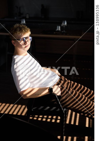 Youthful confident vibe. Casual teen radiates friendly confidence Youthful confident vibe. Casual teen radiates friendly confidence 138995336
