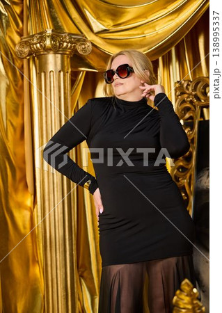 Refined woman with fashionable attire and luxurious background Refined woman with fashionable attire and luxurious background 138995337